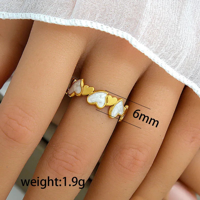 Bague cœurs dorés et blancs