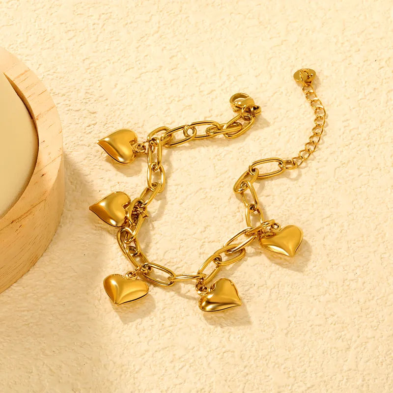 Bracelet Chaîne Cinq Cœurs Dorés